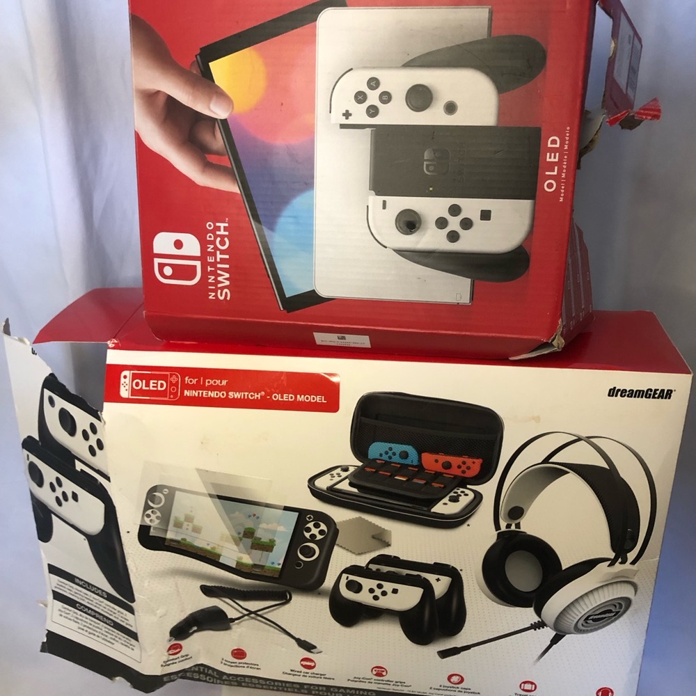 Nintendo Switch OLED Model - White,with accessories & three games Two brand new.